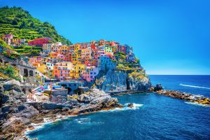 Beautiful colorful cityscape on the mountains over Mediterranean sea, Europe, Cinque Terre, traditio