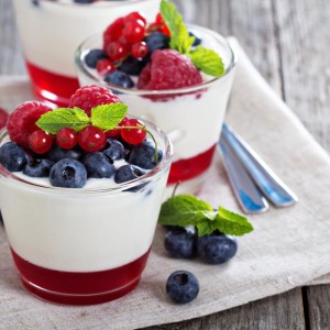 Yogurt dessert with jelly and fresh berries Yogurt dessert with red currant jelly